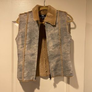 Tan, denim looking style vest with soft faux fur adds great style